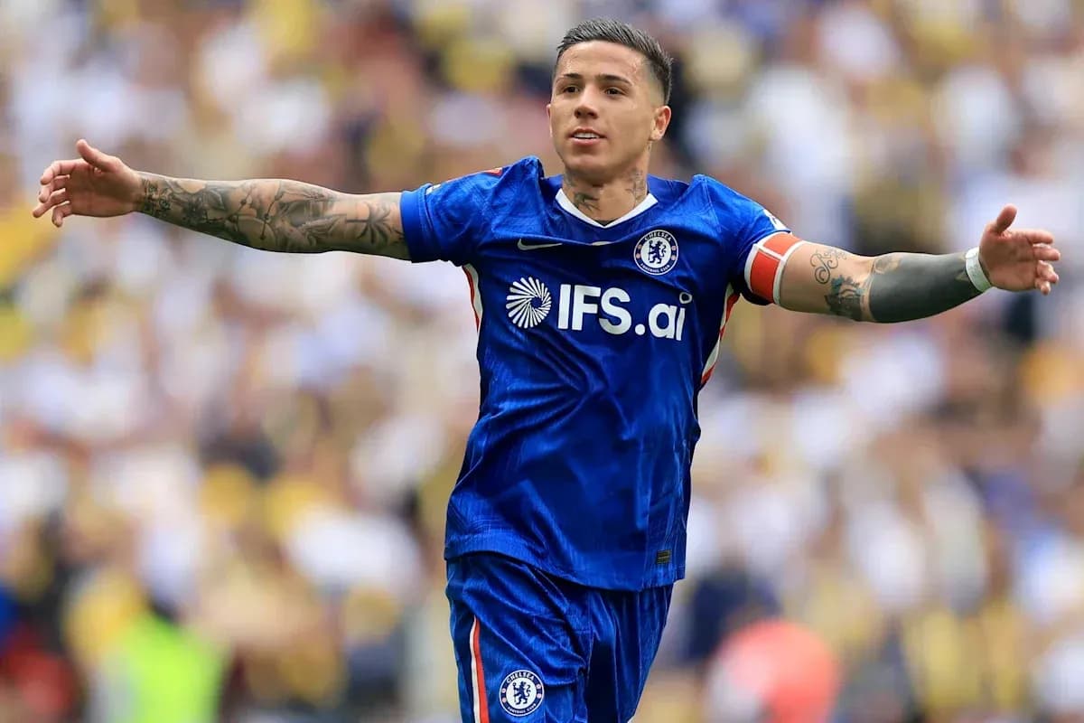 Player celebrating in Chelsea's blue kit on field Player celebrating in Chelsea's blue kit on field