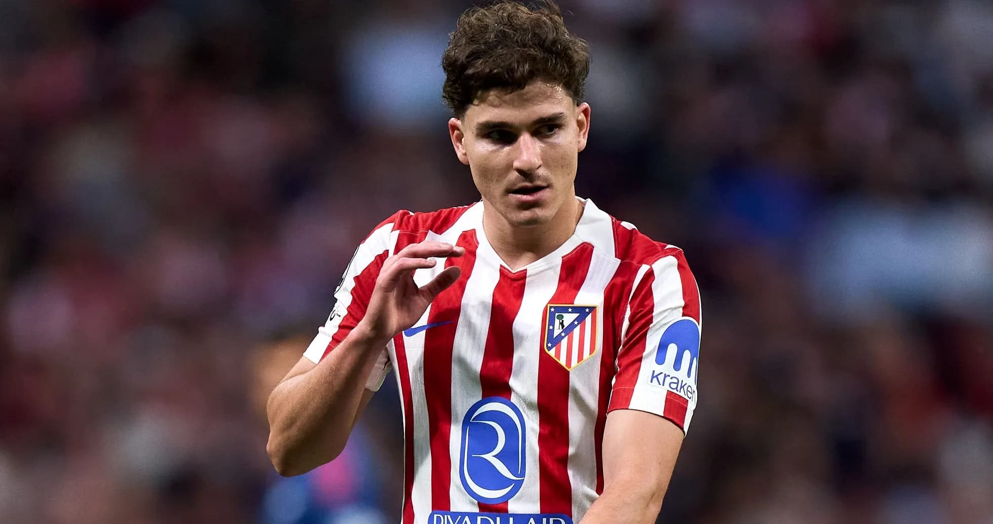 Atletico Madrid player gesturing during match Atletico Madrid player gesturing during match