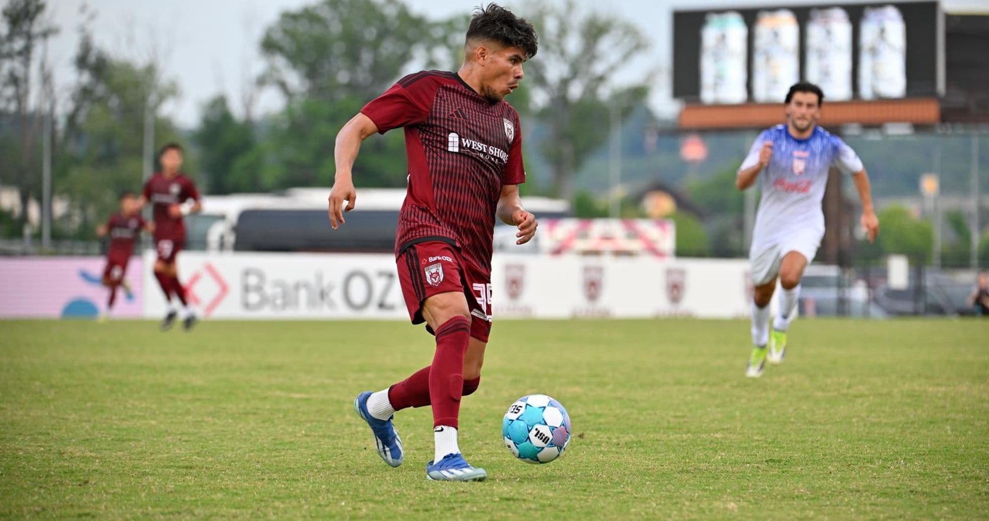 Player dribbling the ball during match Player dribbling the ball during match