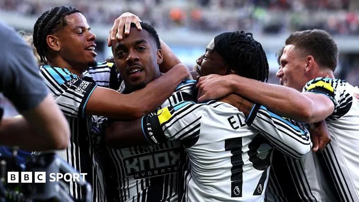 Players celebrating together after scoring a goal Players celebrating together after scoring a goal