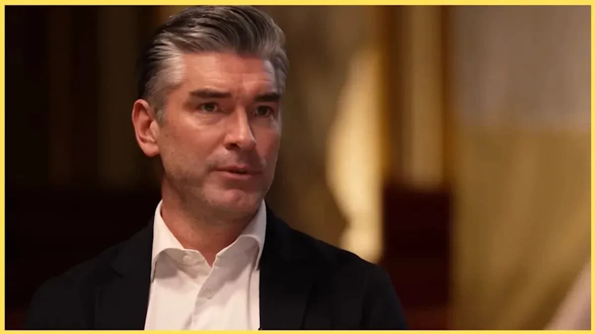 Person speaking during an interview indoors Person speaking during an interview indoors