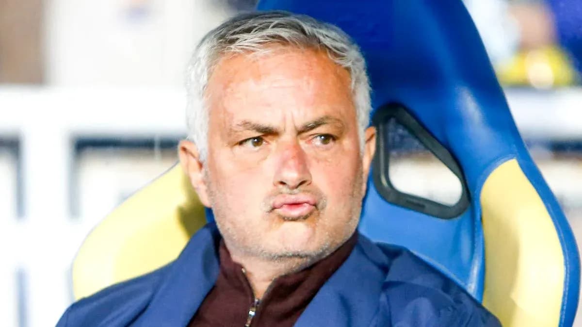 Coach sitting on the bench during a match Coach sitting on the bench during a match