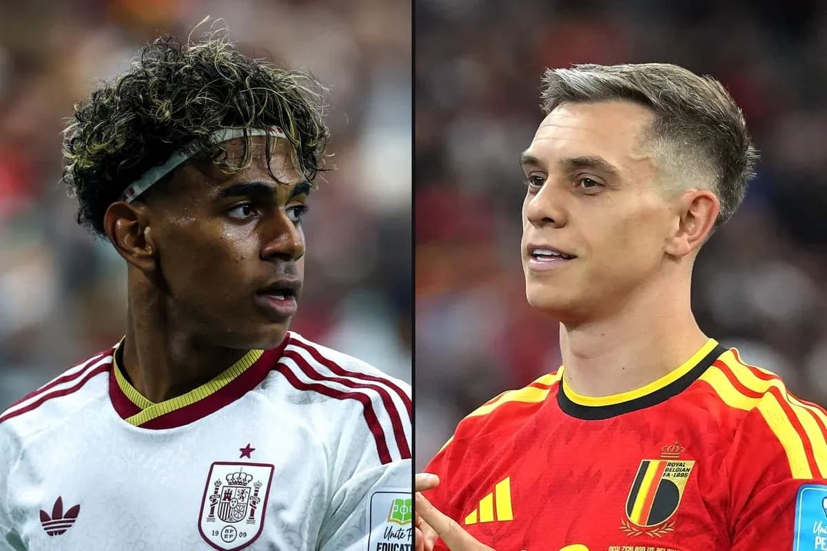 Two football players from Spain and Belgium during match Two football players from Spain and Belgium during match