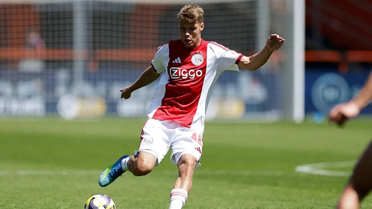 Player kicking ball during a soccer match Player kicking ball during a soccer match
