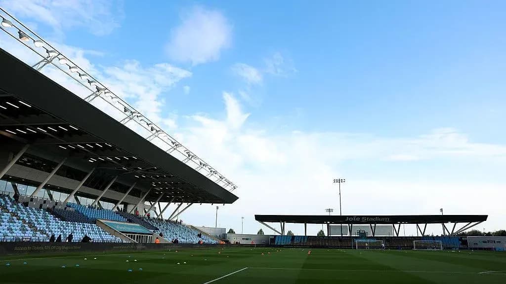 Joie Stadium with empty stands and clear sky Joie Stadium with empty stands and clear sky
