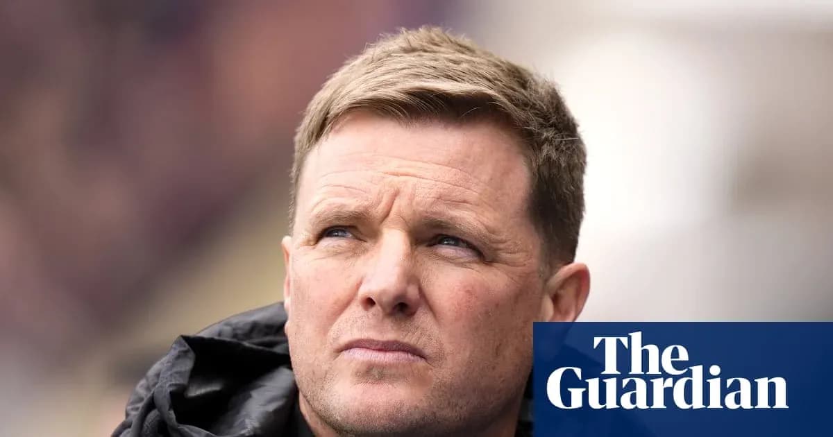 Football manager looking thoughtfully during match Football manager looking thoughtfully during match