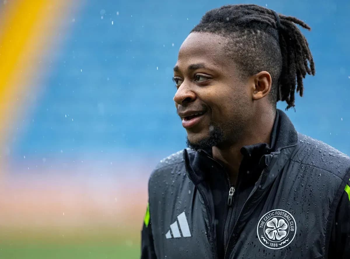 Player wearing Celtic Football Club jacket outdoors Player wearing Celtic Football Club jacket outdoors
