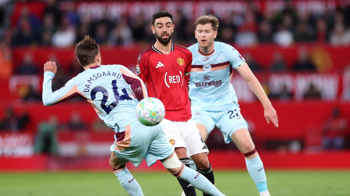 Bruno Fernandes evading a challenge during match Bruno Fernandes evading a challenge during match