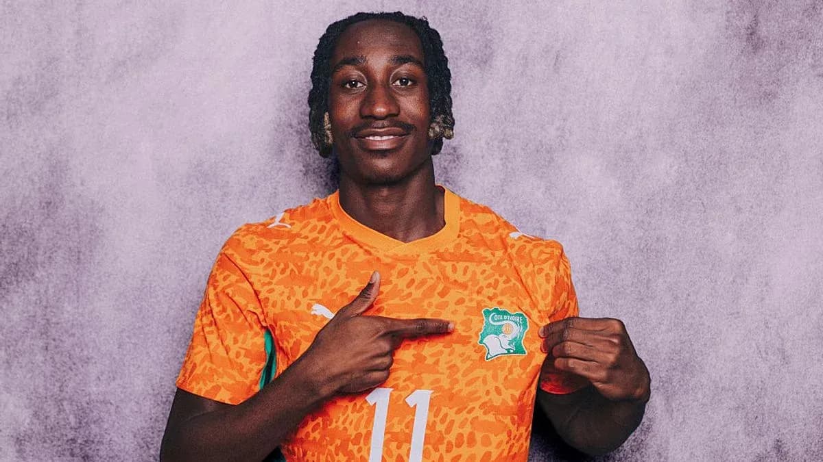 Player pointing at Cote d'Ivoire jersey emblem Player pointing at Cote d'Ivoire jersey emblem
