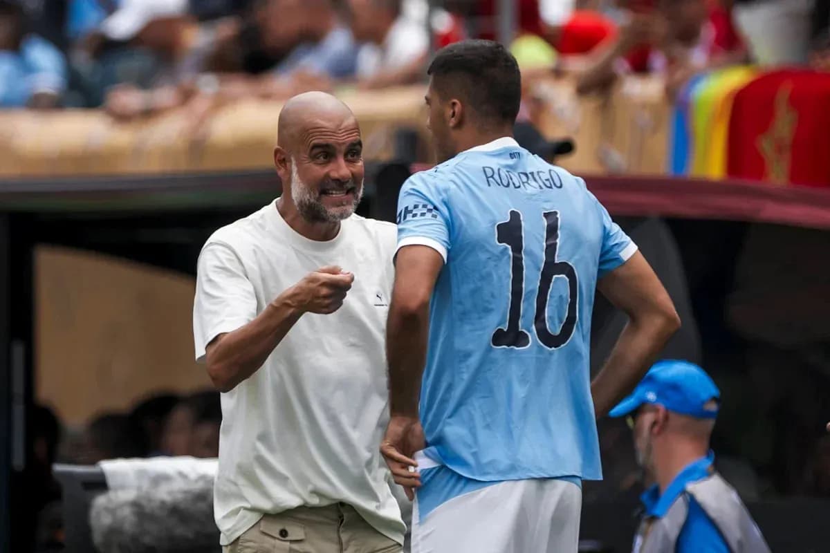 Coach speaking to player Rodrigo during match Coach speaking to player Rodrigo during match