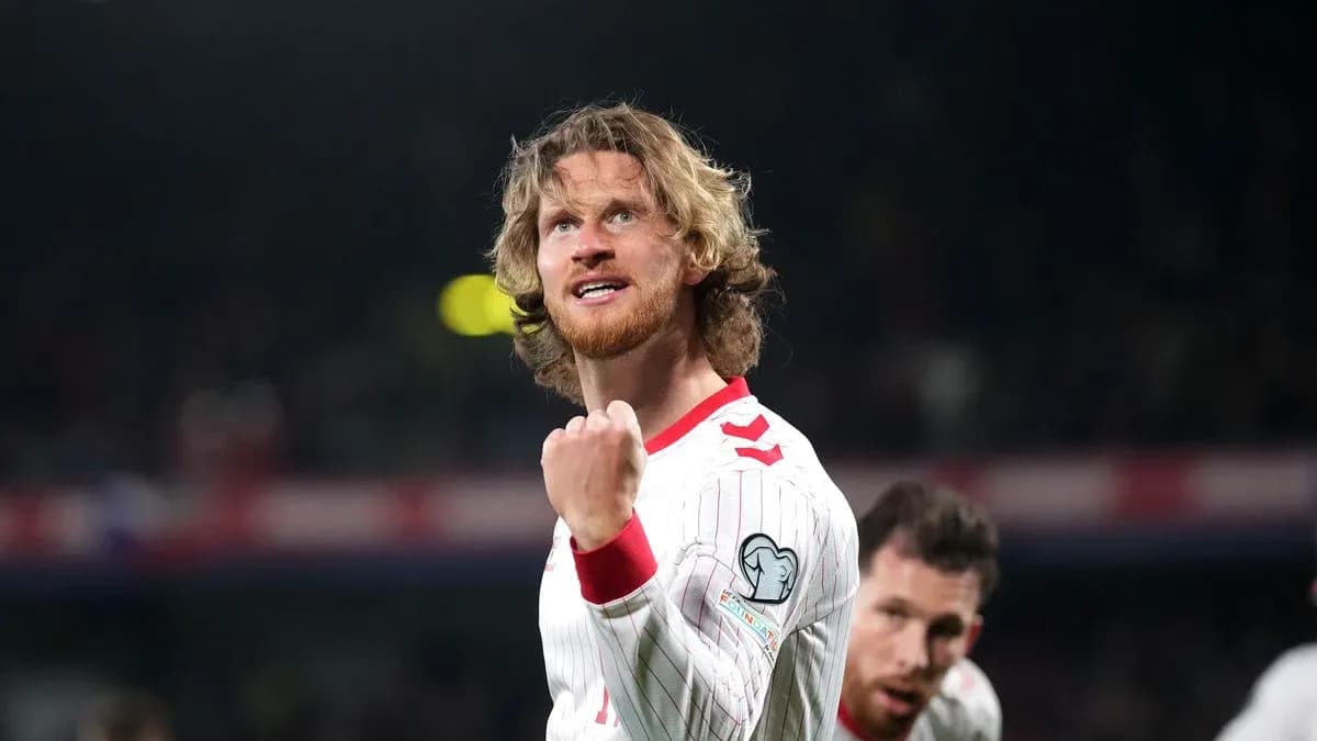 Player celebrating during a football match Player celebrating during a football match