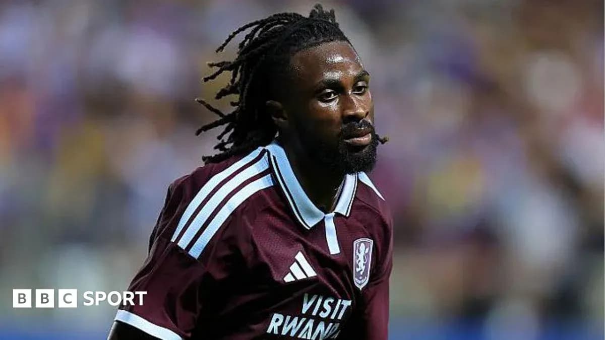 Player in maroon jersey running on the field Player in maroon jersey running on the field
