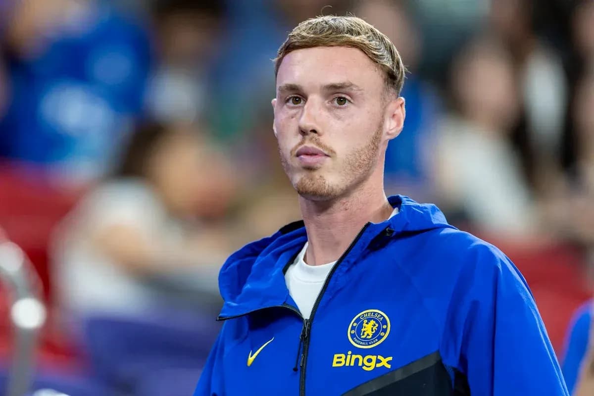 Player in Chelsea training jacket on the sidelines Player in Chelsea training jacket on the sidelines