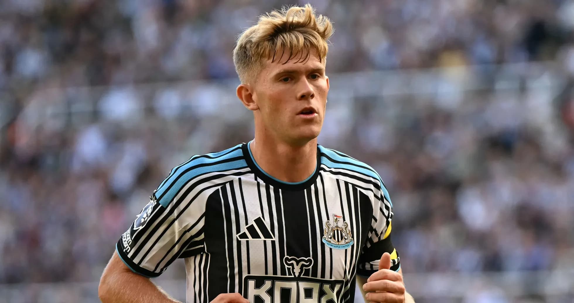 Newcastle player running on the pitch during match Newcastle player running on the pitch during match