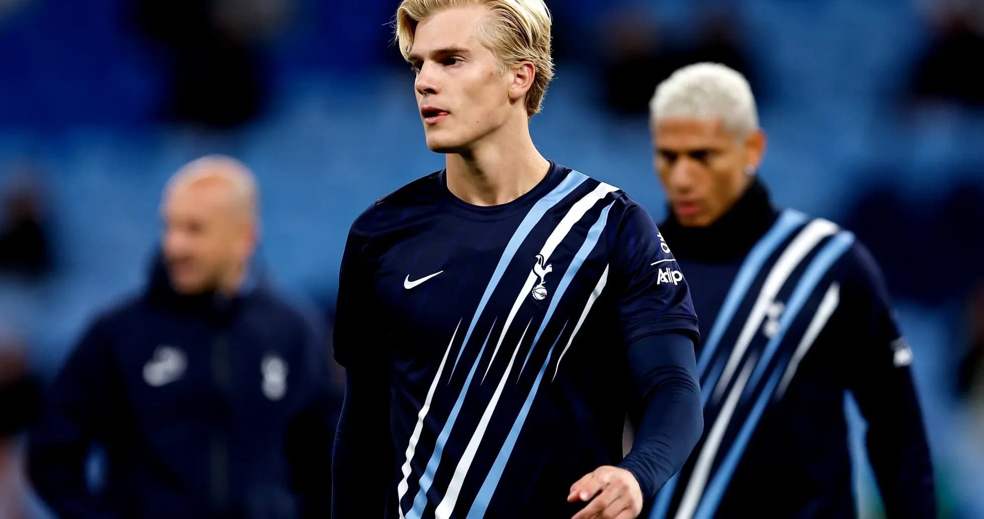 Player in Tottenham kit walking on the pitch Player in Tottenham kit walking on the pitch