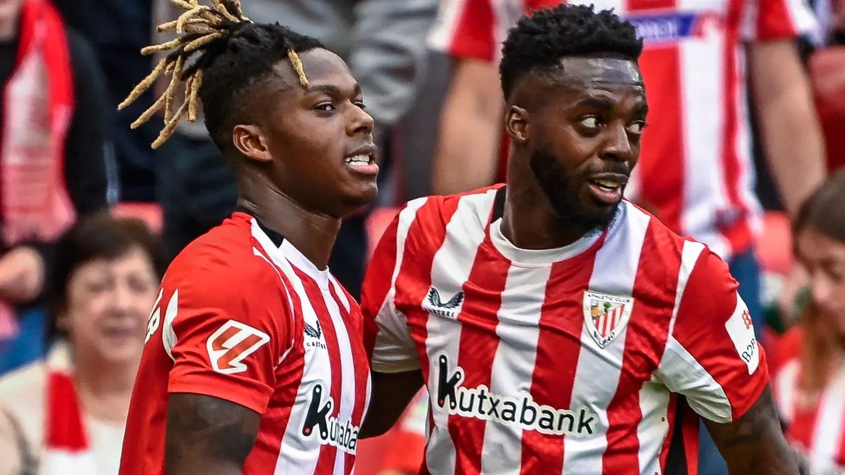 Two players celebrating during a match Two players celebrating during a match