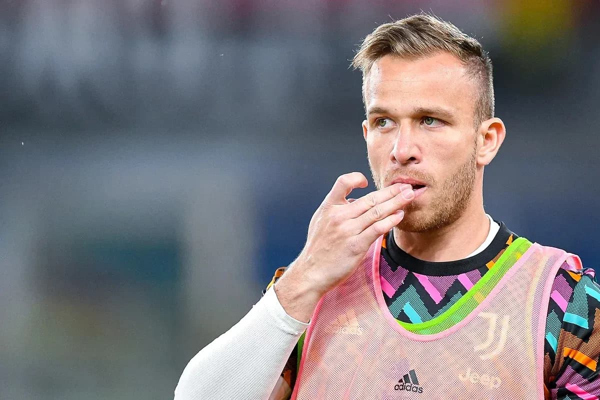 Player in colorful training gear touching his lips Player in colorful training gear touching his lips