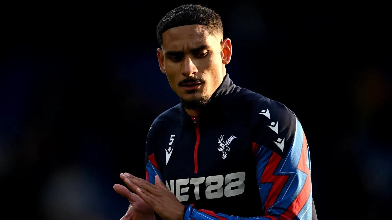 Player in Crystal Palace kit during match warm-up Player in Crystal Palace kit during match warm-up