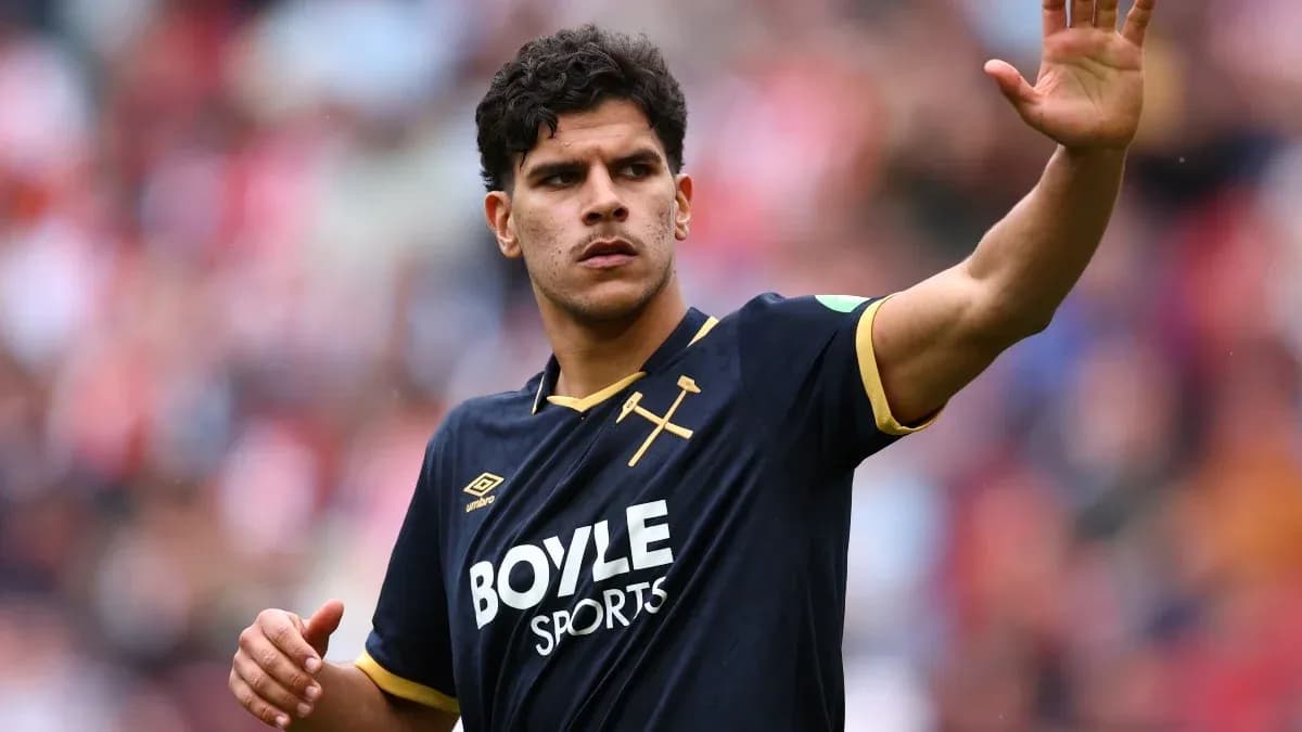 Player gesturing during a football match Player gesturing during a football match