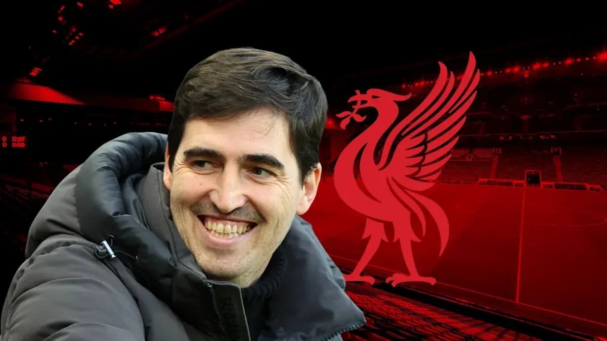 Coach smiling in front of Liverpool stadium background Coach smiling in front of Liverpool stadium background