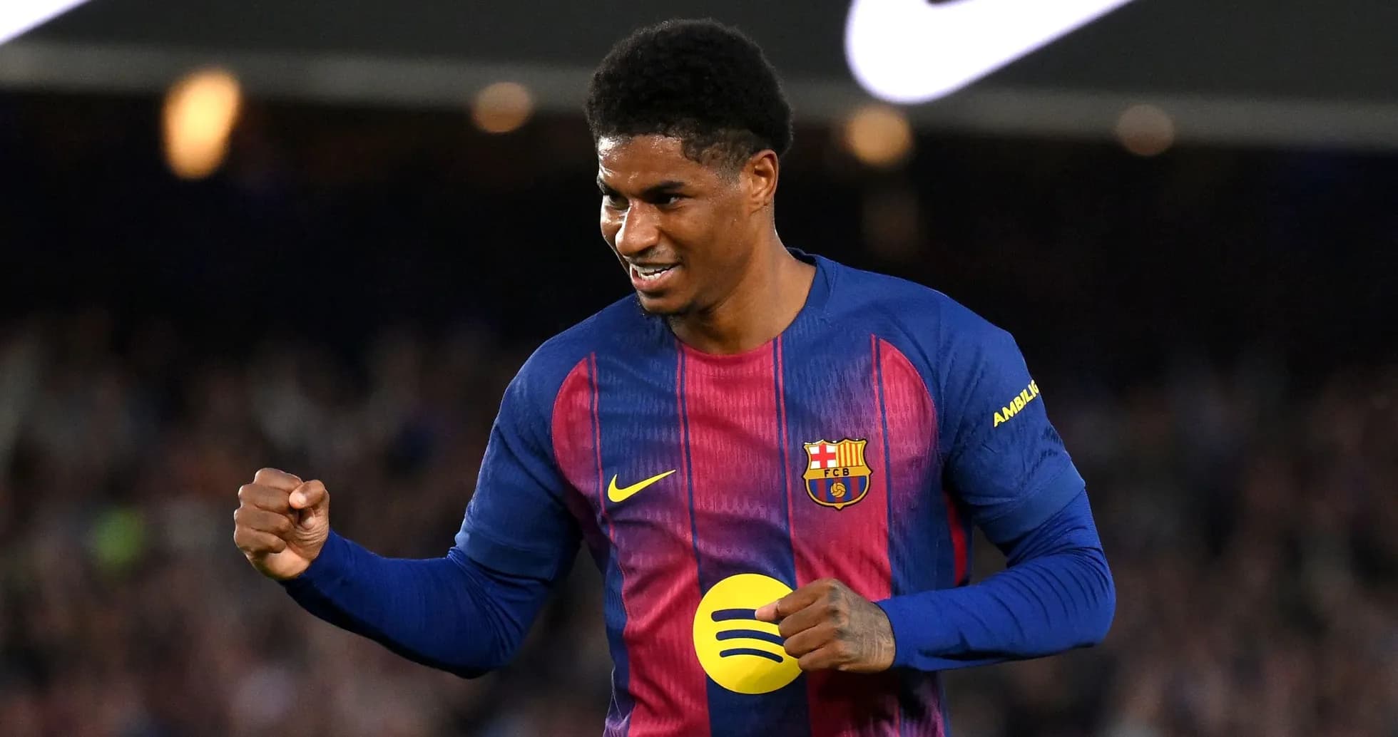 Player celebrating after scoring a goal for Barcelona Player celebrating after scoring a goal for Barcelona
