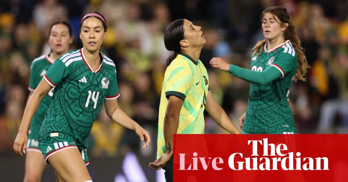 Players from Mexico and Australia during soccer match Players from Mexico and Australia during soccer match