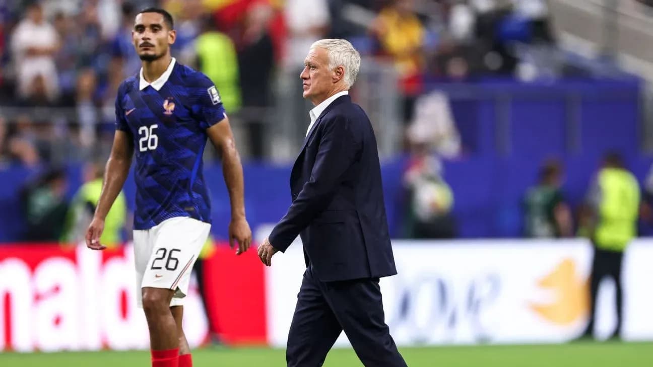 France coach walking past player on the field France coach walking past player on the field