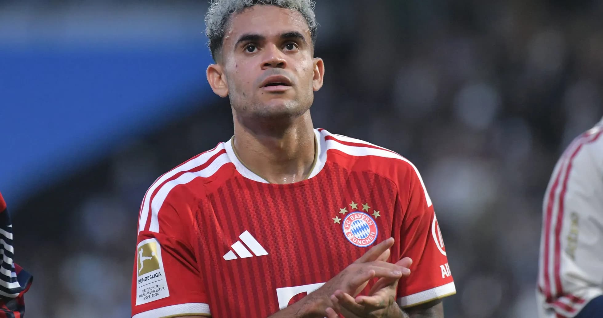 Player in Bayern Munich jersey clapping during match Player in Bayern Munich jersey clapping during match