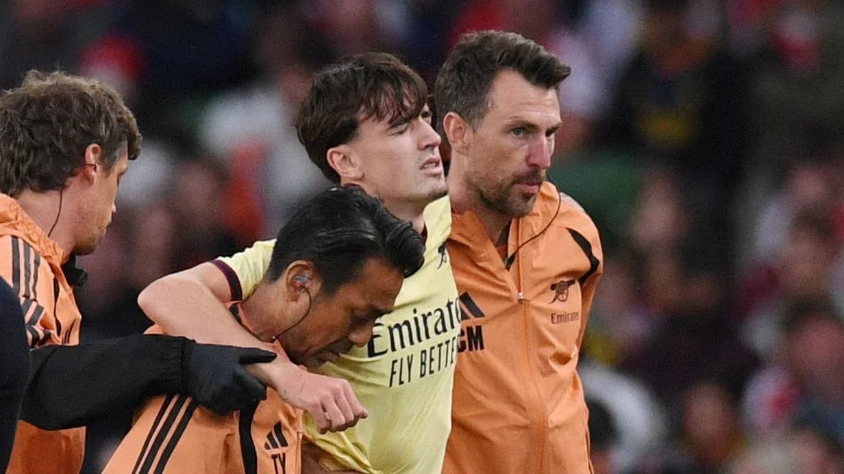 Player assisted off the field by medical staff Player assisted off the field by medical staff