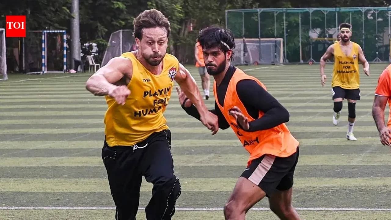 Two players competing for the ball in practice Two players competing for the ball in practice