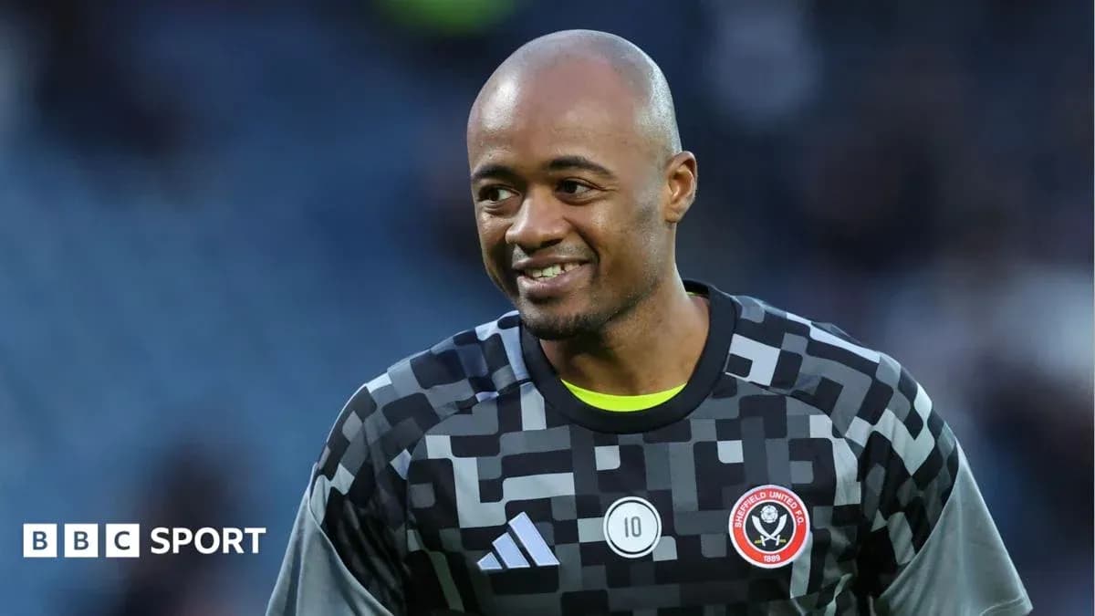 Goalkeeper smiling during warm-up at stadium Goalkeeper smiling during warm-up at stadium