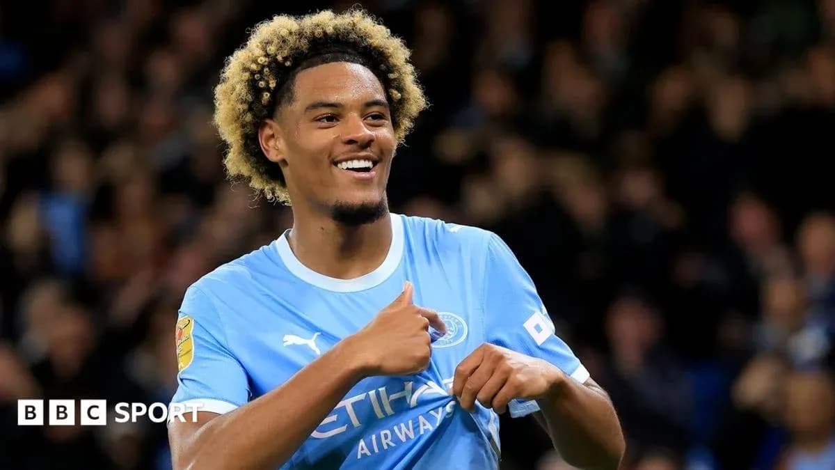 Player celebrating with thumbs up after scoring Player celebrating with thumbs up after scoring