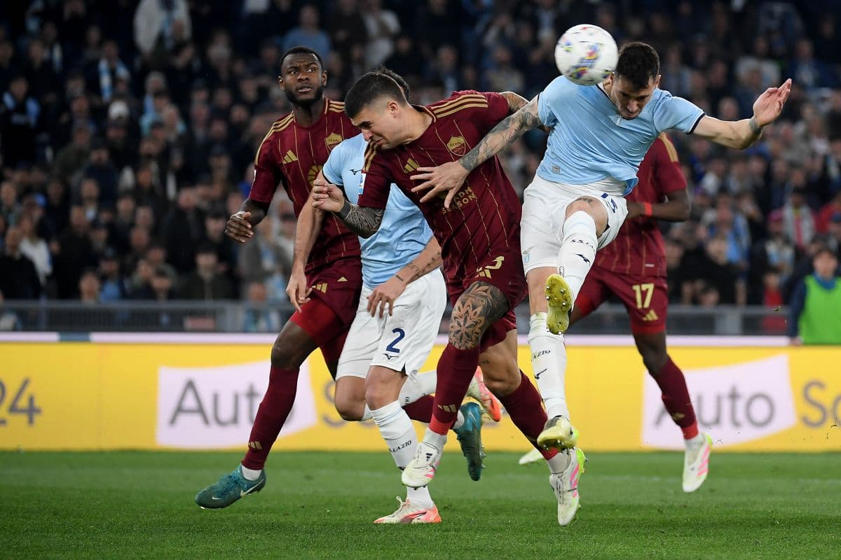 AS Roma and Lazio players competing for the ball AS Roma and Lazio players competing for the ball