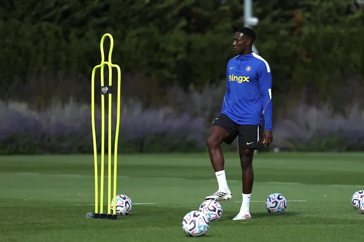 Player practicing next to training cones and balls Player practicing next to training cones and balls