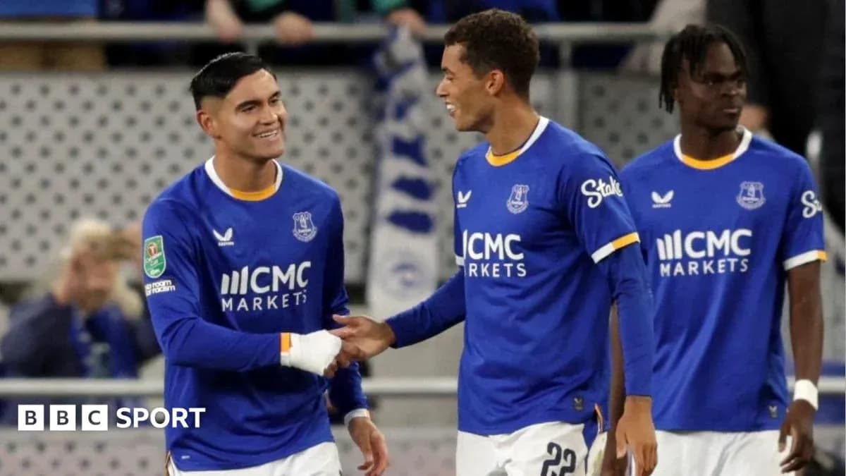 Everton players celebrating on the pitch Everton players celebrating on the pitch