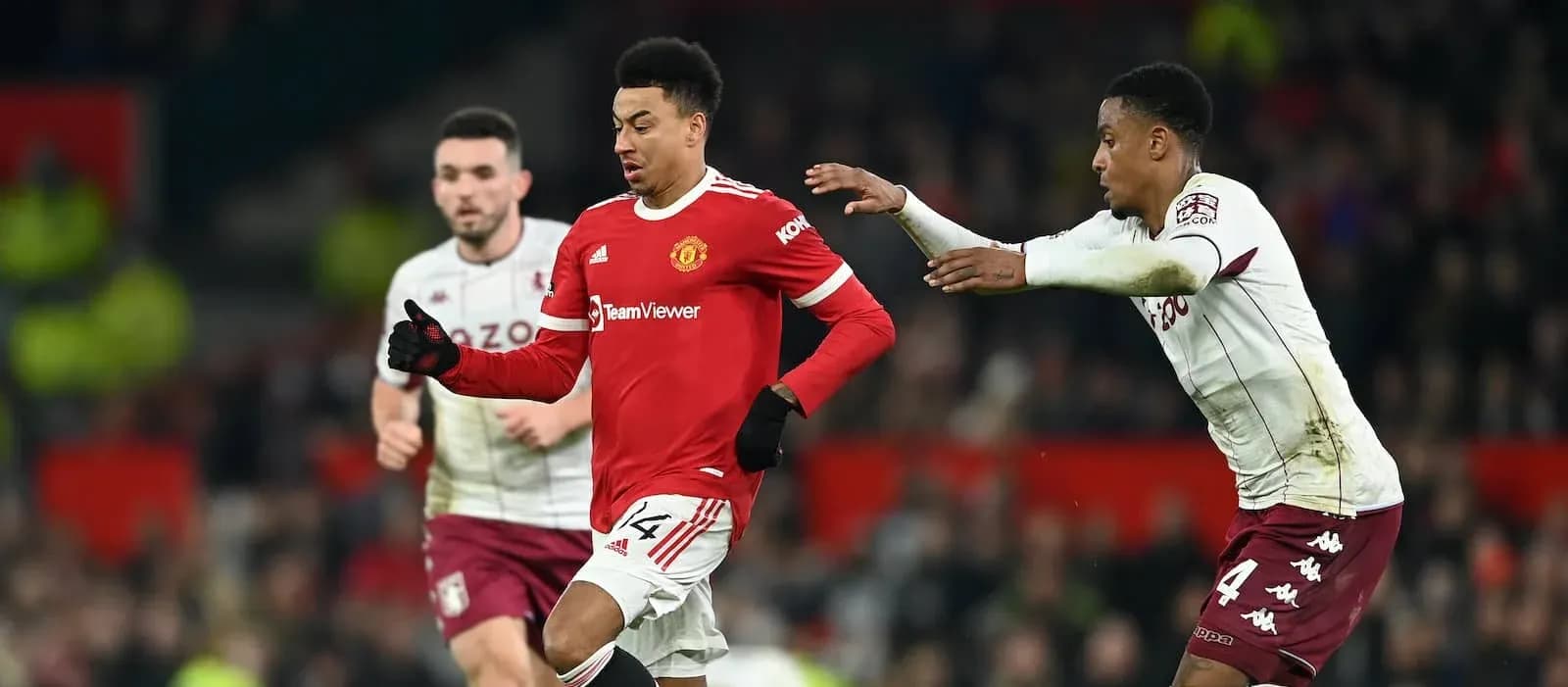 Jesse Lingard dribbling past opponent during match Jesse Lingard dribbling past opponent during match