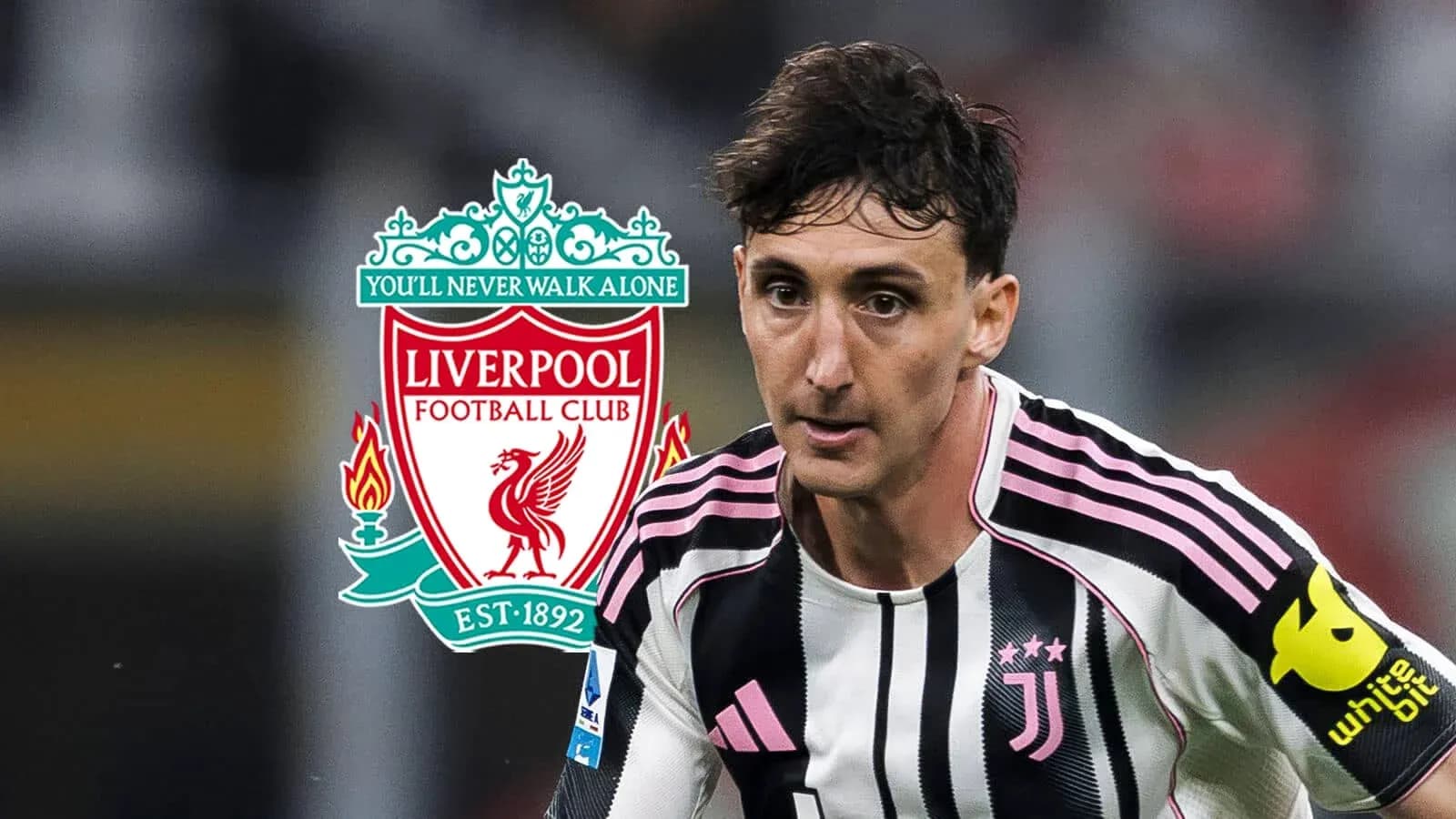 Player in Juventus kit with Liverpool logo background Player in Juventus kit with Liverpool logo background
