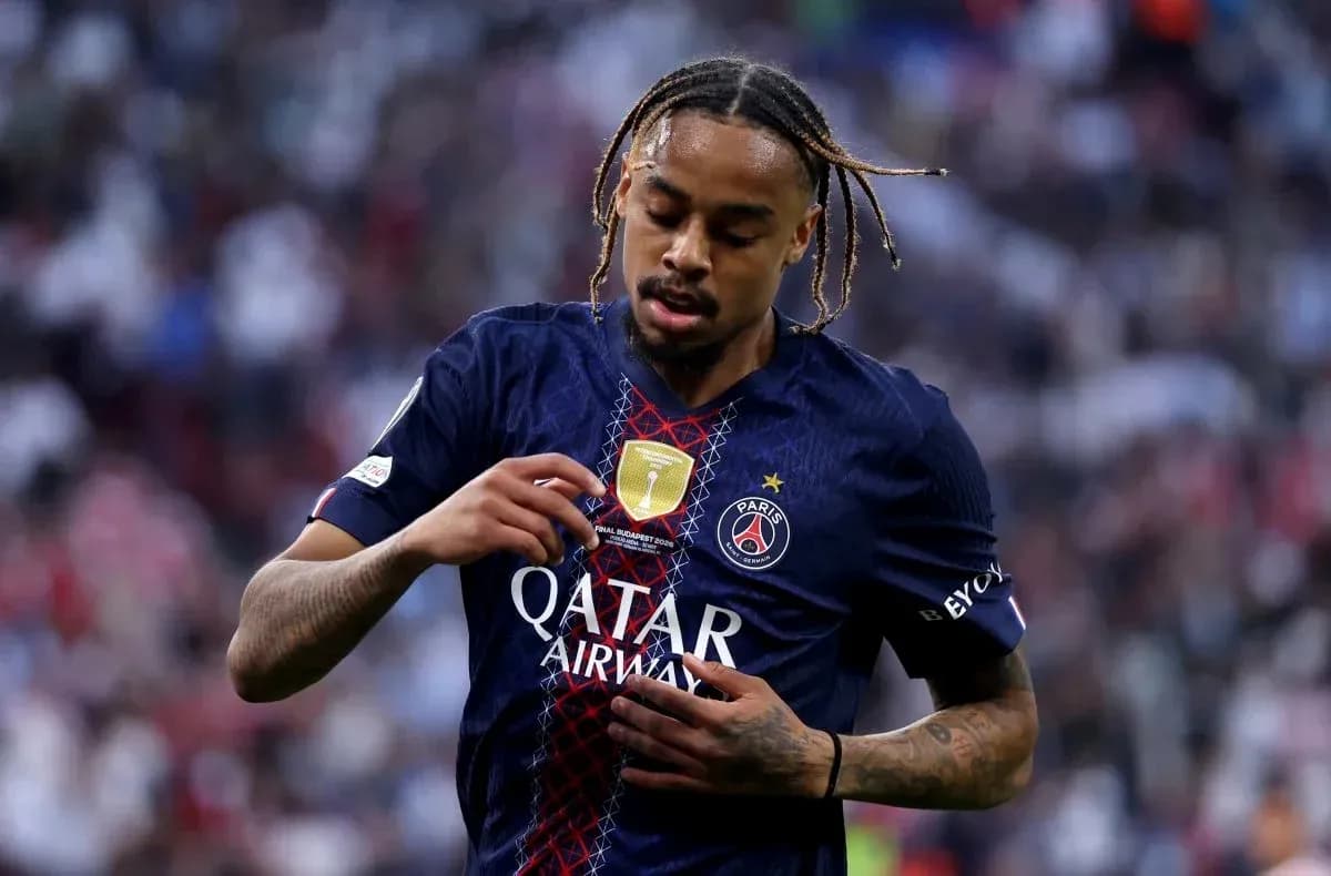 Player adjusting jersey during match for Paris Saint-Germain Player adjusting jersey during match for Paris Saint-Germain