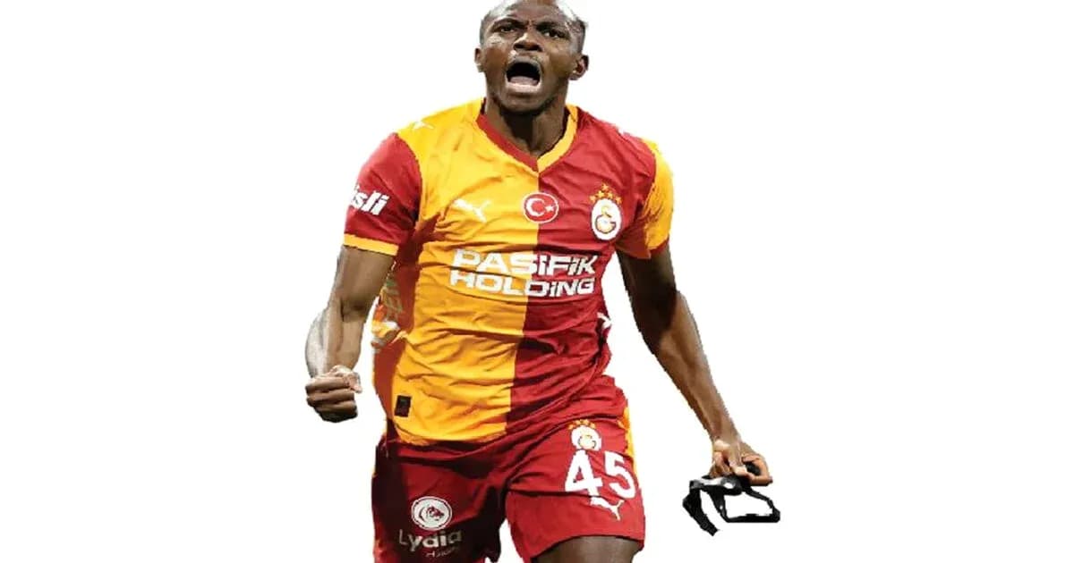 Player celebrating with jersey after scoring a goal Player celebrating with jersey after scoring a goal