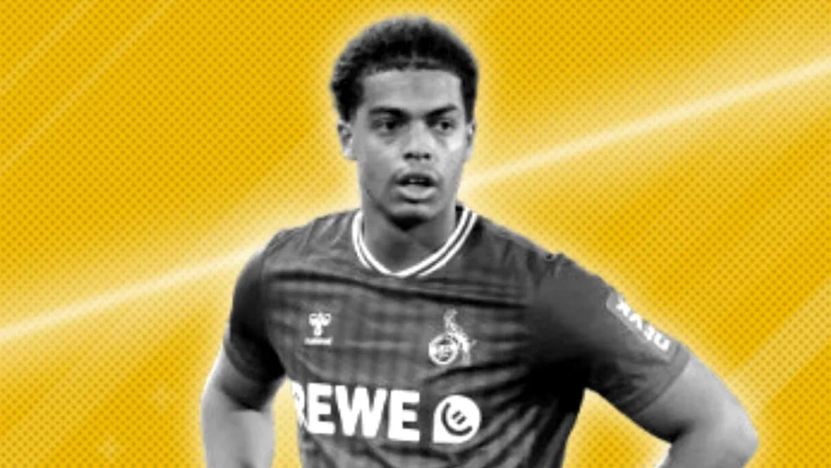 Player in REWE jersey on yellow background Player in REWE jersey on yellow background