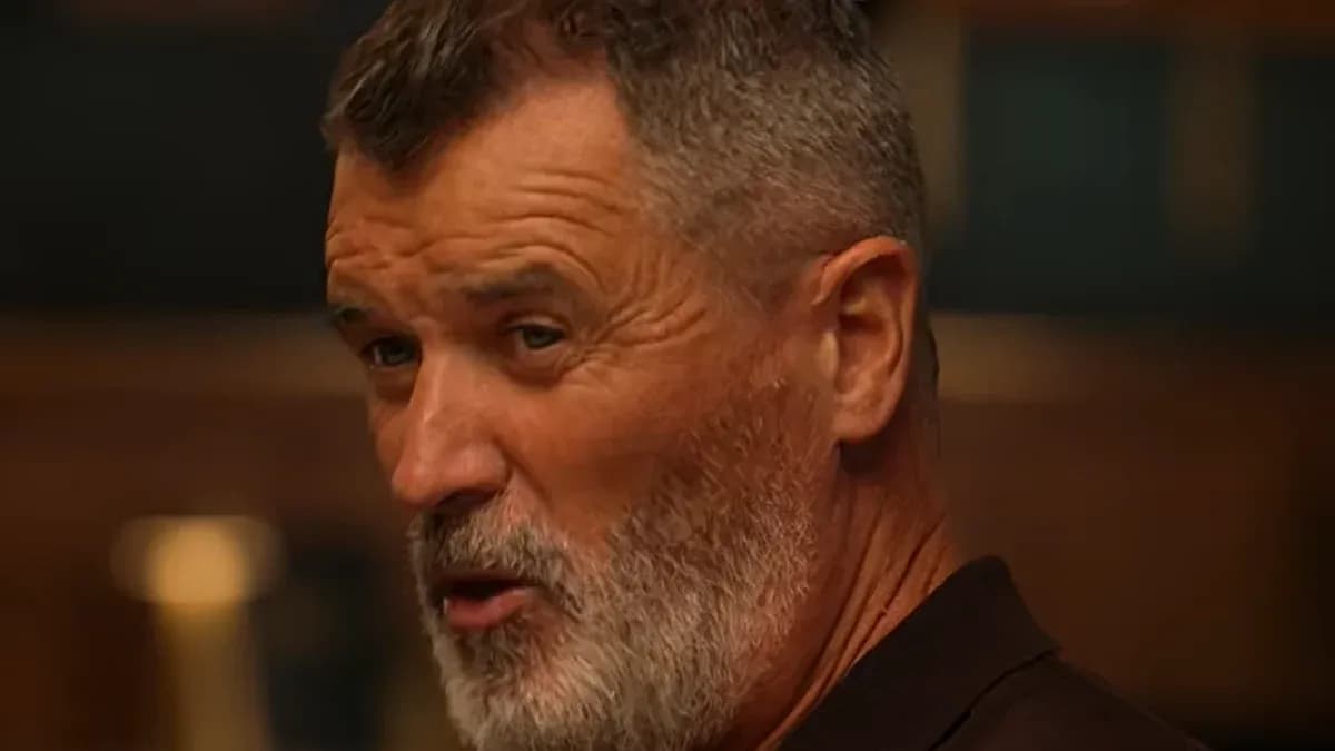 Man with a beard speaking during a discussion Man with a beard speaking during a discussion