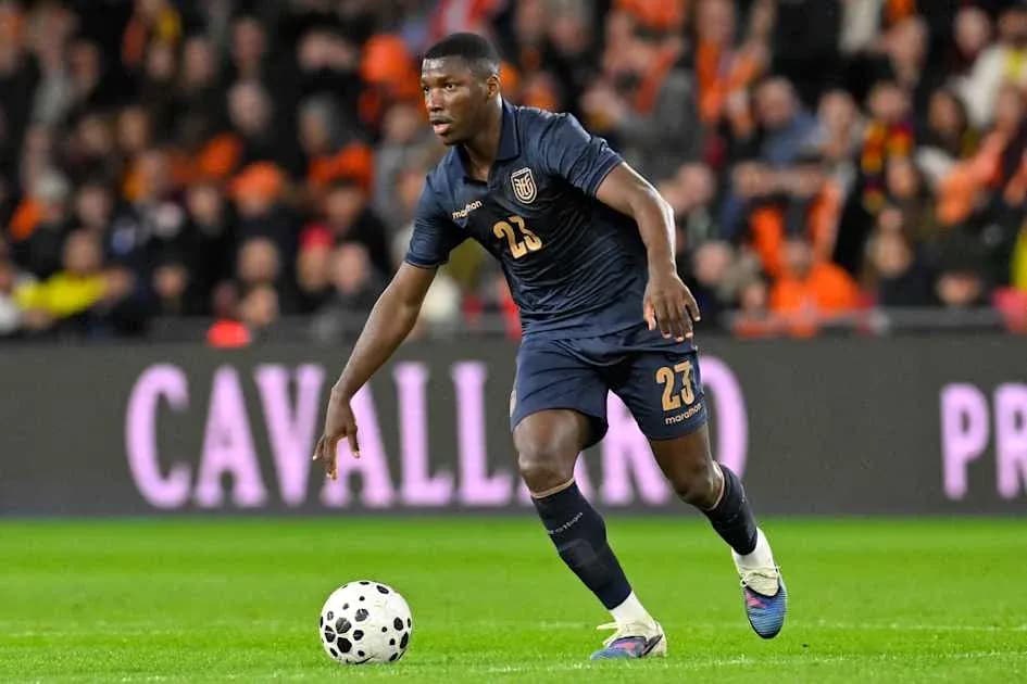 Player in blue kit dribbling a soccer ball Player in blue kit dribbling a soccer ball