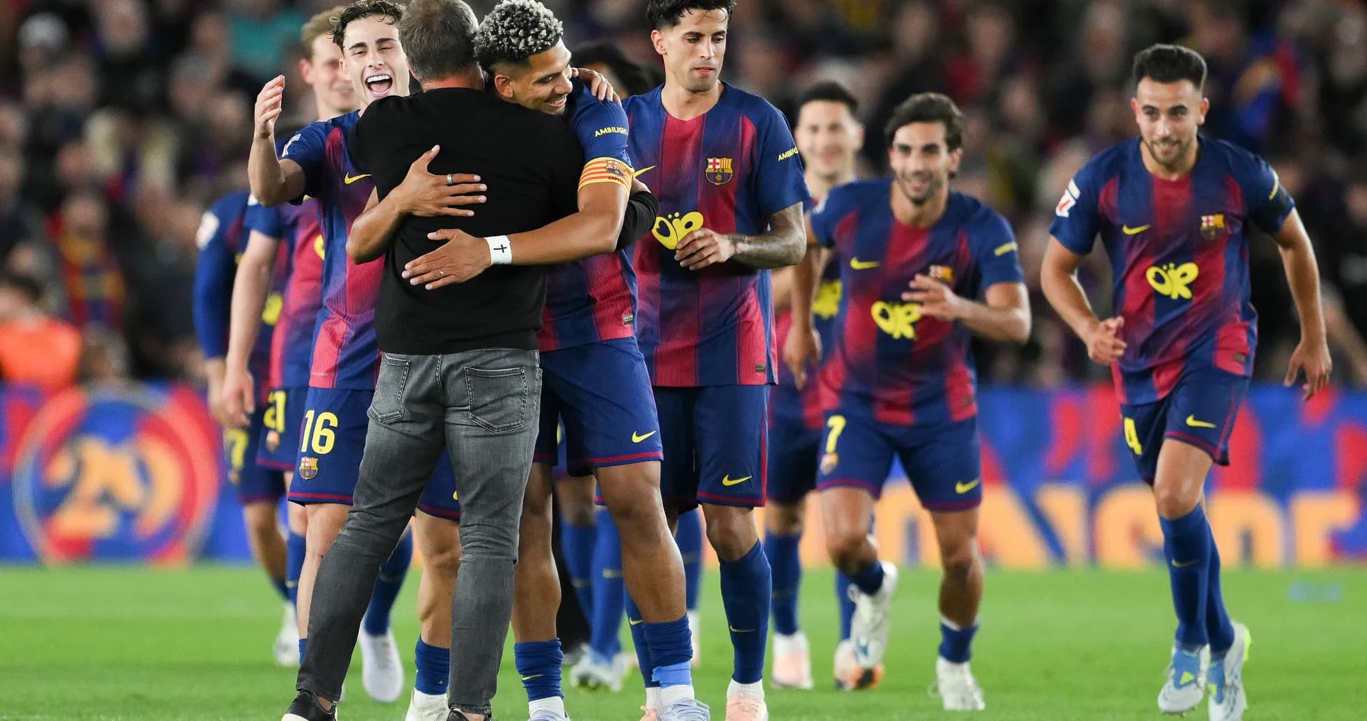 Barcelona players celebrating with their coach after match Barcelona players celebrating with their coach after match