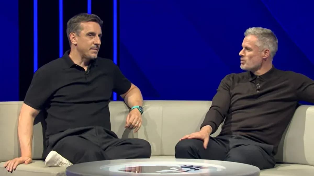 Two analysts discussing sports on a sofa Two analysts discussing sports on a sofa