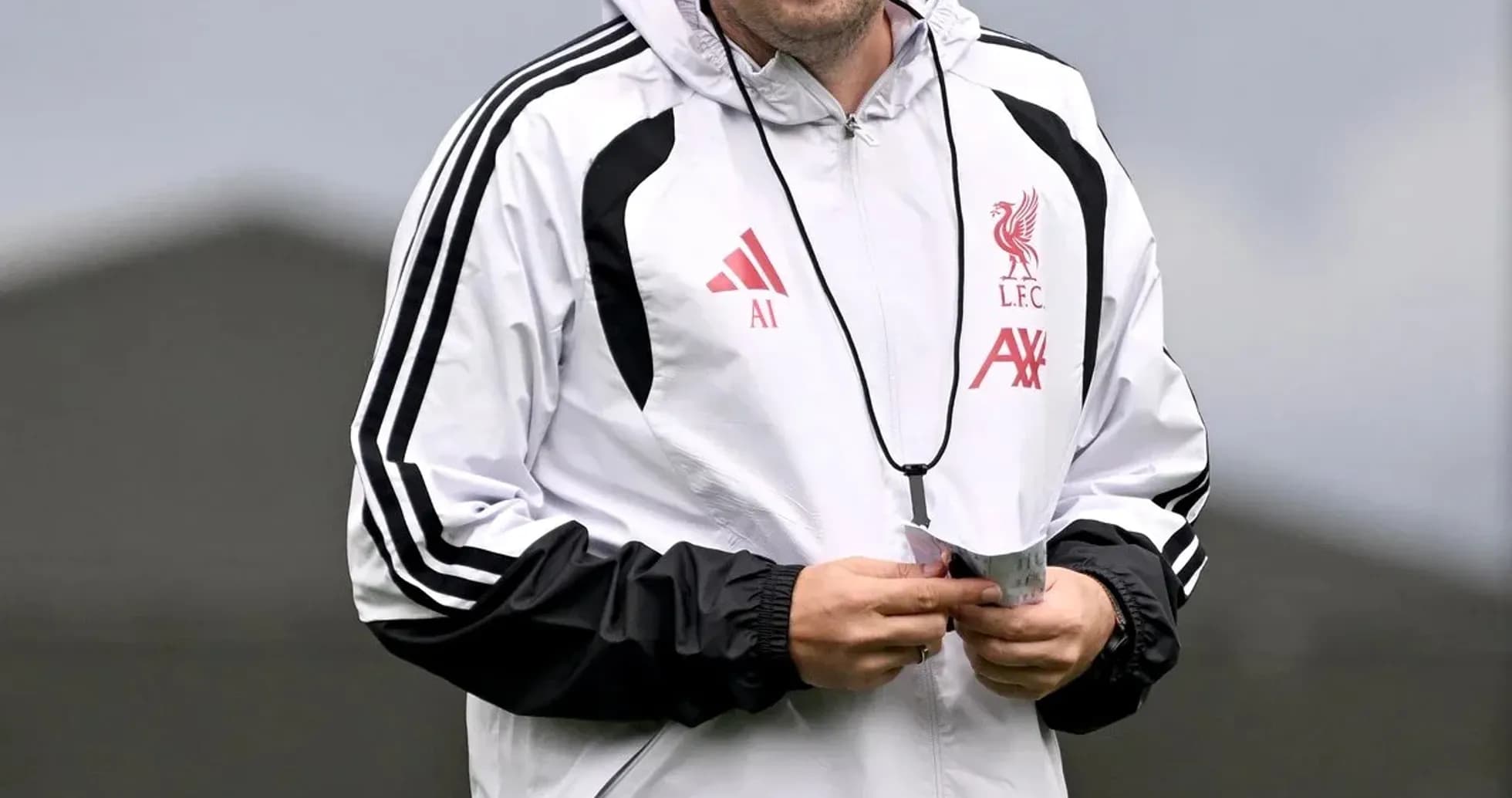 Coach smiling during training session at Liverpool FC Coach smiling during training session at Liverpool FC