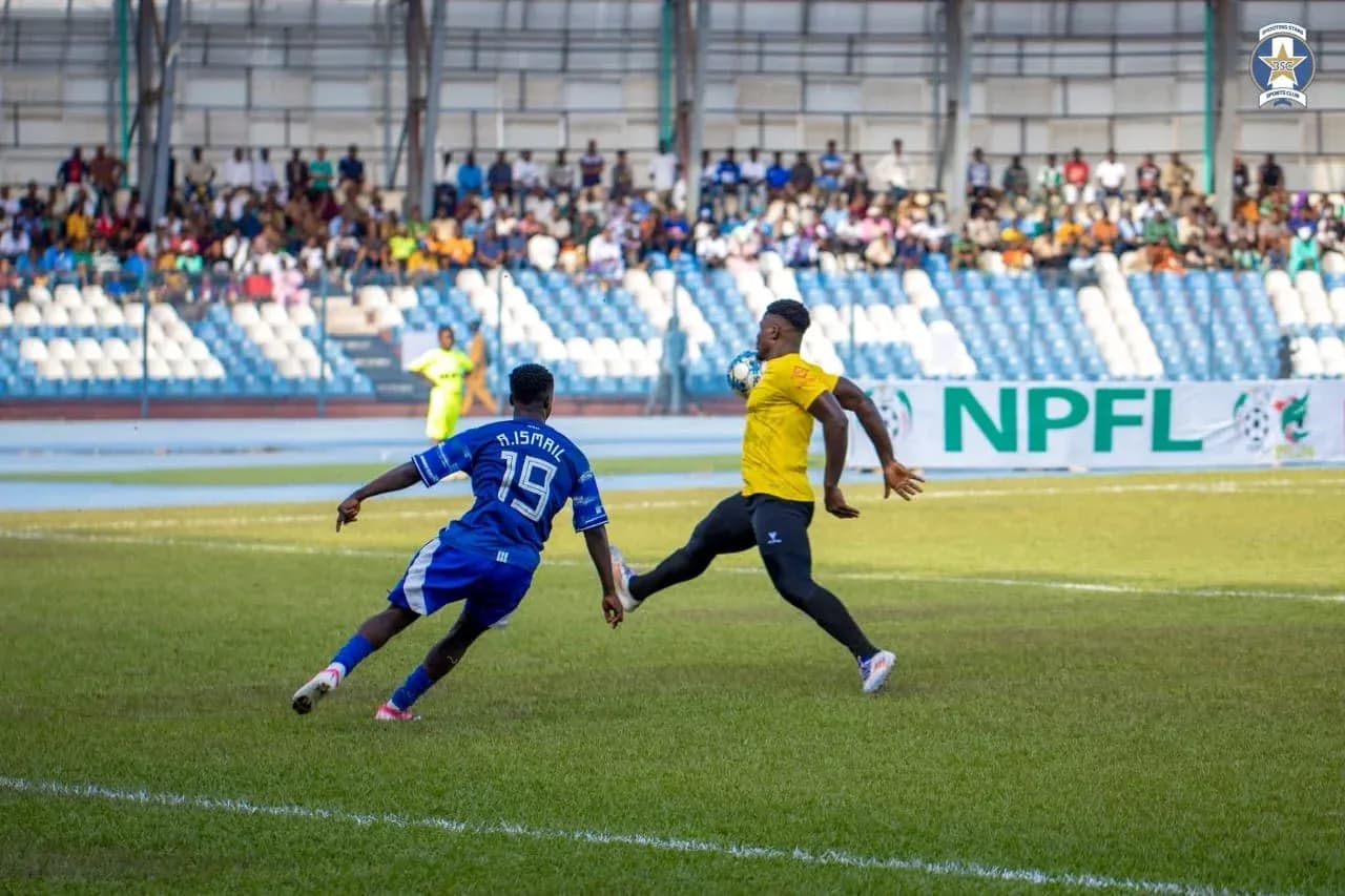 Player attempting to score against goalkeeper Player attempting to score against goalkeeper