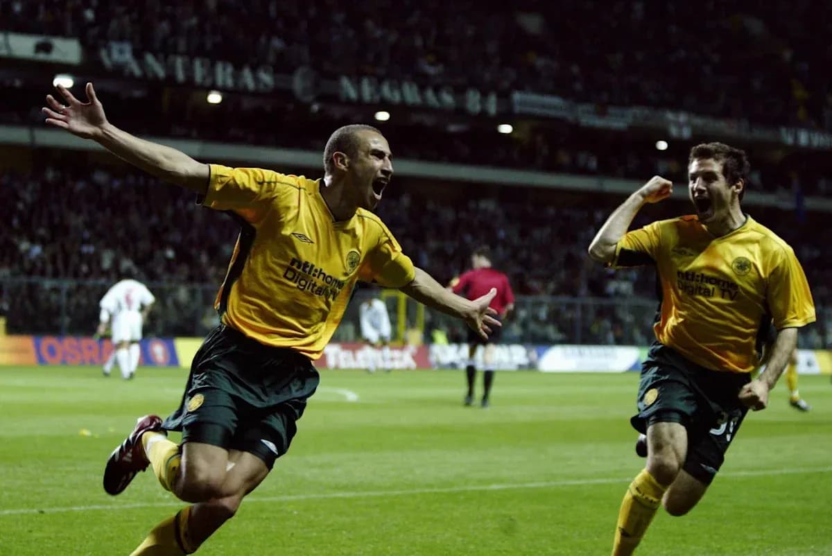Two players celebrating a goal during a match Two players celebrating a goal during a match