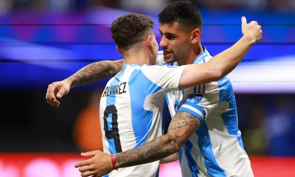 Two Argentine players celebrating a goal together Two Argentine players celebrating a goal together