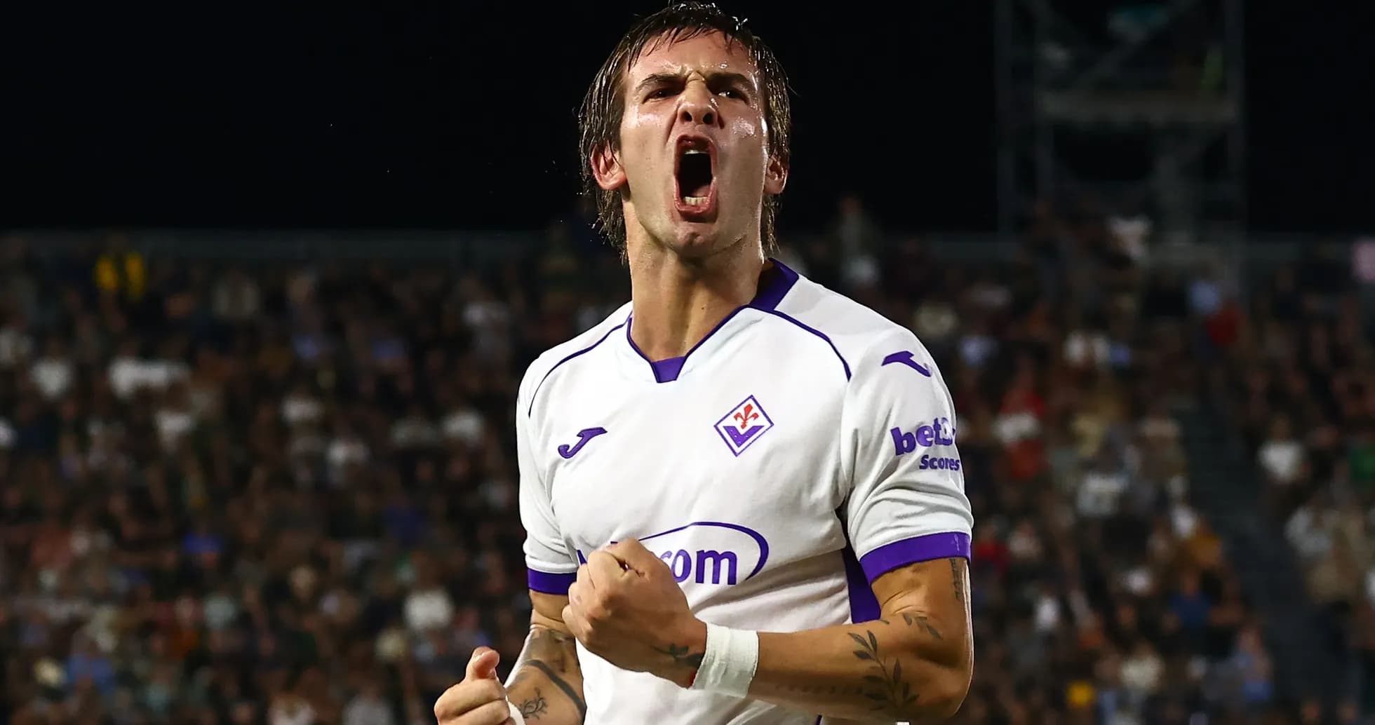 Player celebrating a goal with clenched fist Player celebrating a goal with clenched fist