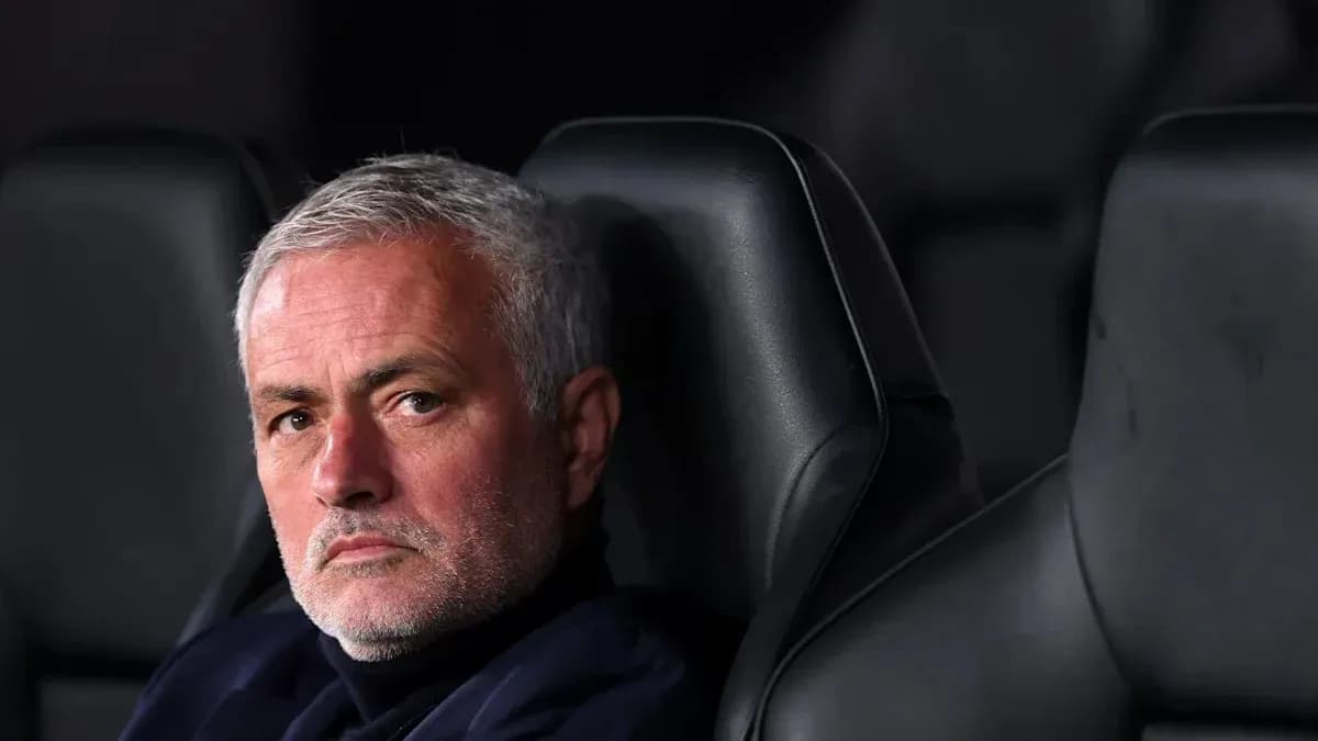 Coach sitting on the bench during a match Coach sitting on the bench during a match